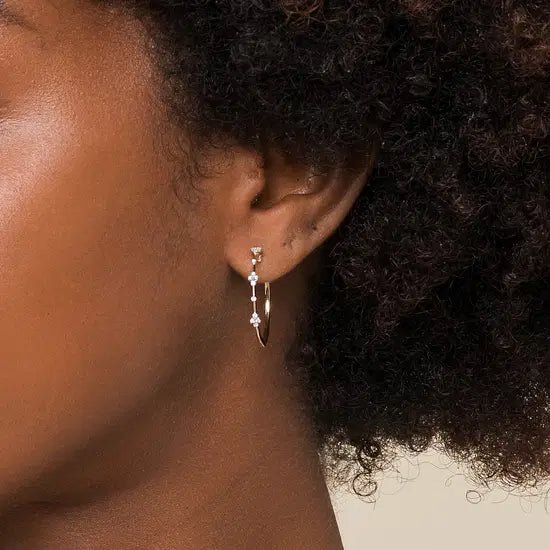 Gabriel & Co Medium Hoop Earrings with 0.14ctw Diamonds in 14K Yellow Gold - MJ Christensen Diamonds