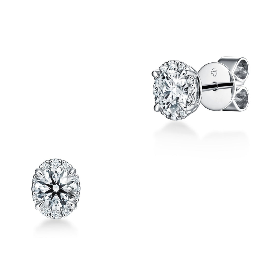 Hearts on Fire Ellipse Graduated Halo Leverback Earrings in 18K White Gold (1.75ctw) - MJ Christensen Diamonds