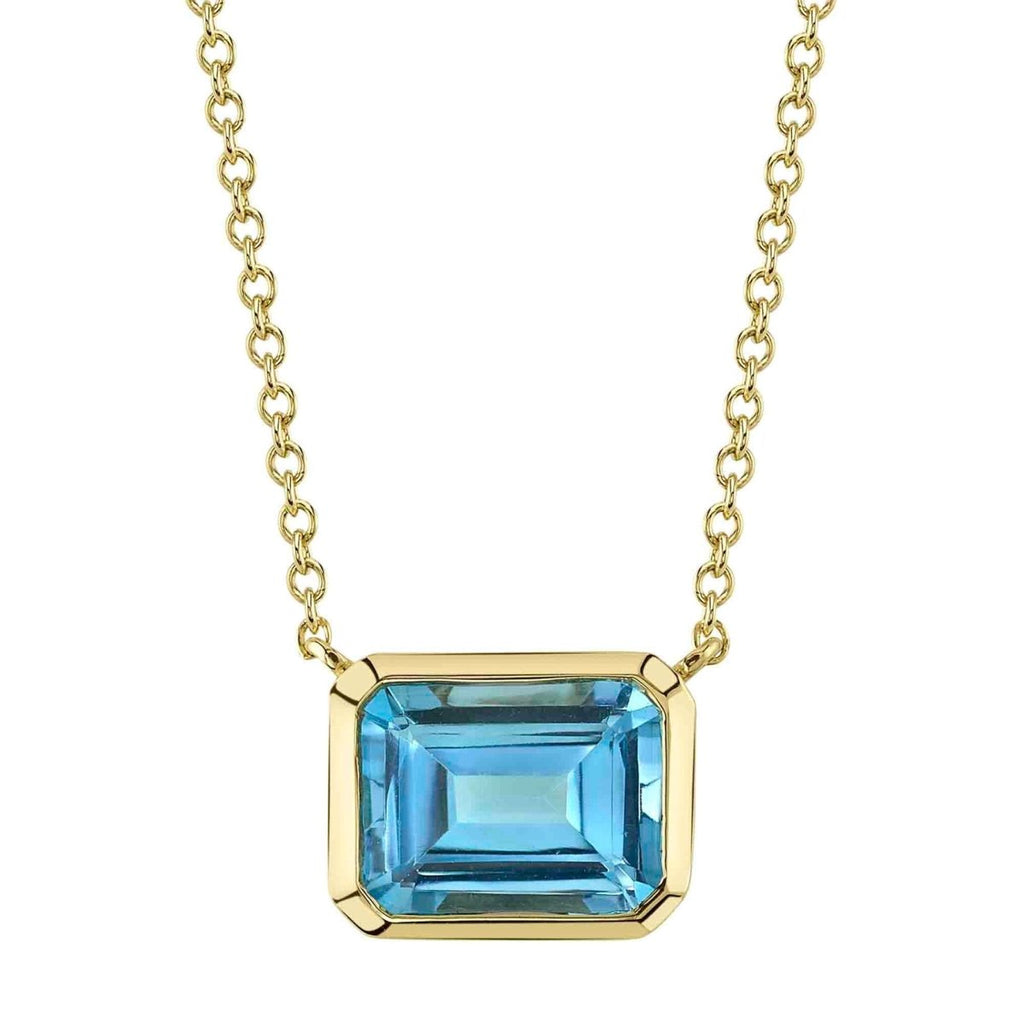 SHY Creation Emerald Cut Blue Topaz East/West Bezel Pendant in 14K Yellow Gold - MJ Christensen Diamonds